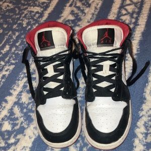 I am selling real Nike shoes. Red and white, they are creased and a bit dirty.